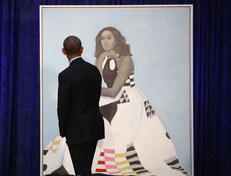 Former President Barack Obama looks at former first lady Michelle Obama’s portrait. (Mark Wilson/Getty Images)